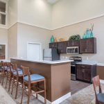 Community room kitchen at The Legends at Whitney Town Center