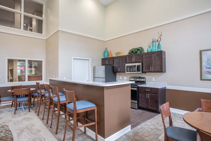 Community room kitchen at The Legends at Whitney Town Center